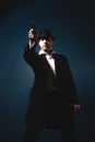 Man holding a handgun Royalty Free Stock Photo