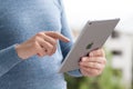 Man holding in hands new iPad Pro Space Gray