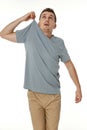 man holding himself by the shoulders on white background Royalty Free Stock Photo