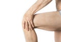Man is holding his aching knee with a hand Royalty Free Stock Photo
