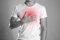 The man is holding his chest. Chest pain. Heartburn. The hearth Royalty Free Stock Photo