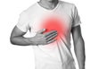 The man is holding his chest. Chest pain. Heartburn. The hearth Royalty Free Stock Photo