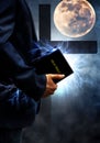 Man holding his powerful bible Royalty Free Stock Photo