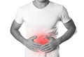 The man is holding his stomach. Abdominal pain. The hearth is hi Royalty Free Stock Photo