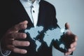 Man holding illustration world map. International business concept