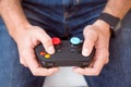 Man holding joystick in both hands Royalty Free Stock Photo