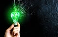 Man holding the lamp bulb. New idea concept. Green lightning Royalty Free Stock Photo