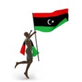 man holding Libyan Flag