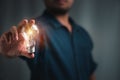Man holding light bulbs, ideas of new ideas with innovative technology and creativity