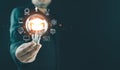 Man holding lightbulb showing education icon, Internet education course degree Royalty Free Stock Photo
