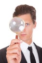 Man Holding Magnifying Glass