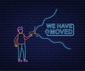 Man holding megaphone - We have moved. Neon style. Vector stock illustration.