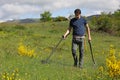 Man holding metal detector Royalty Free Stock Photo