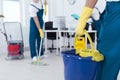 Man holding mop bucket Royalty Free Stock Photo