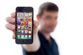 Man Holding a New iPhone 5