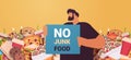 man holding no junk food placard unhealthy nutrition junkfood addiction stop fast food concept