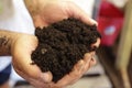 Man Holding Nutrient Rich Potting Soil