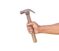 A man holding an old and rusty hammer isolated Royalty Free Stock Photo