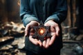 A man holding an old and rusty star of David in their hands on ruins background. Royalty Free Stock Photo