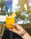 Man holding orange juice Royalty Free Stock Photo