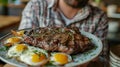Young Man Holding Out A Plate Filled with Steak and Eggs. Generative AI Royalty Free Stock Photo