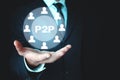 Man holding P2P word with people icon. Concept of peer to peer