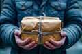 Man holding package with string tied around it. Generative AI Royalty Free Stock Photo