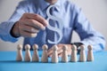 Man holding Paragraph symbol. Human figures on the desk