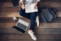 Man holding pencil writing notepad paper learning and research course tutoring education online on laptop with the coffee cup, Royalty Free Stock Photo