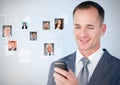 Man holding phone with Profile portraits of people contacts Royalty Free Stock Photo