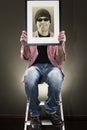 Man holding picture frame Royalty Free Stock Photo