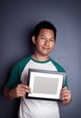 Man holding picture frame Royalty Free Stock Photo
