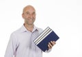 Man holding a pile of books Royalty Free Stock Photo