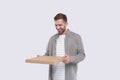 Man Holding Pizza Box Isolated. Fast Food, Unhealthy food Concept Isolated Royalty Free Stock Photo