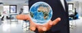 Man holding the planet earth in his hand Royalty Free Stock Photo