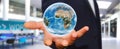 Man holding the planet earth in his hand Royalty Free Stock Photo