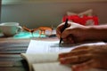 Man holding the pocket book.retired worker spend the with book. writer is collecting information from reading books.student do his