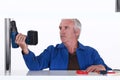 Man holding a power tool Royalty Free Stock Photo