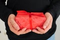 Man holding red gift Royalty Free Stock Photo