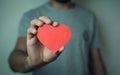 Man holding red heart. Royalty Free Stock Photo