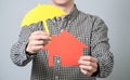 Man holding red house model Royalty Free Stock Photo