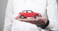 Man holding red toy car Royalty Free Stock Photo