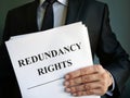 Man is holding Redundancy rights law