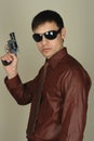 Man holding revolver Royalty Free Stock Photo