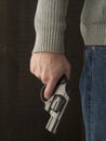 Man holding a revolver Royalty Free Stock Photo