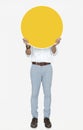 Man holding a round yellow board Royalty Free Stock Photo