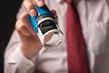 Man holding rubber stamp close up. Businessman certify documents