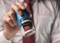 Man holding rubber stamp close up. Businessman certify documents