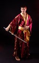Man holding samurai sword Royalty Free Stock Photo