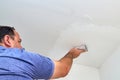 Polishing a ceiling Royalty Free Stock Photo